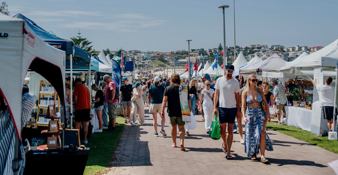 Folks walking through markets in Bondi