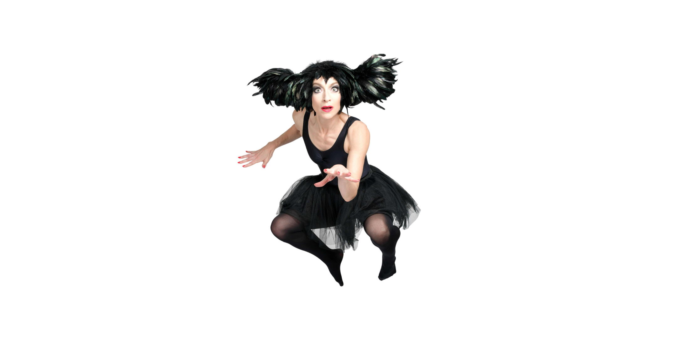 Image of woman with feathery headpiece and black short dress jumping in the air